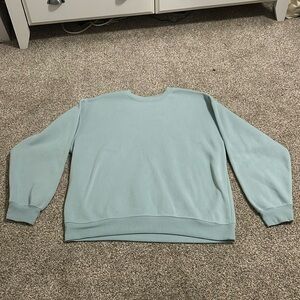 light teal size medium crewneckk
